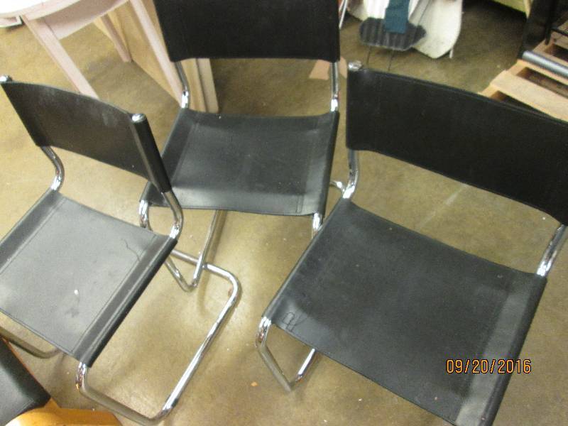 lot 131 image: 3 black chairs and a foot rest...