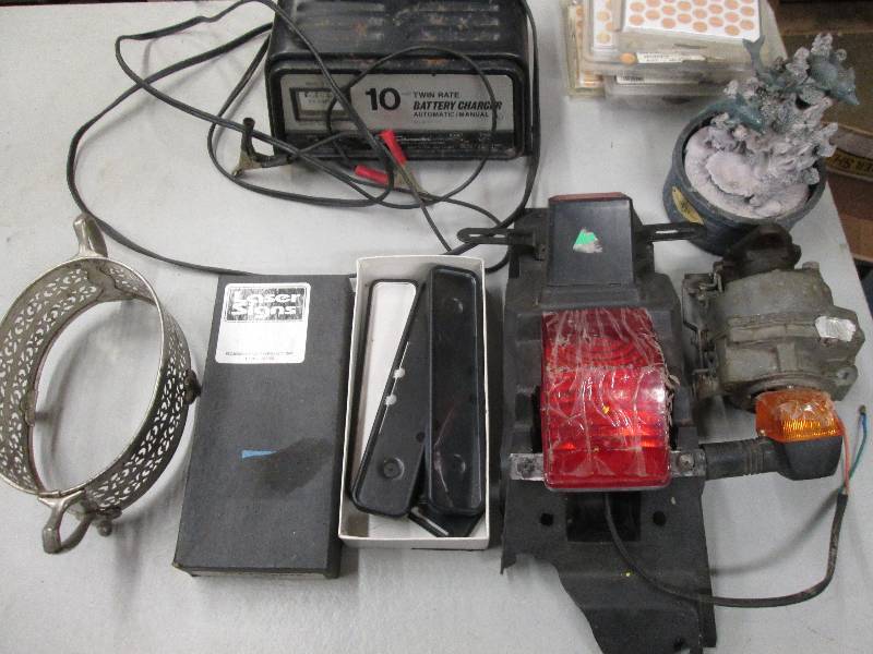 lot 225 image: battery charger plugged in and turn...