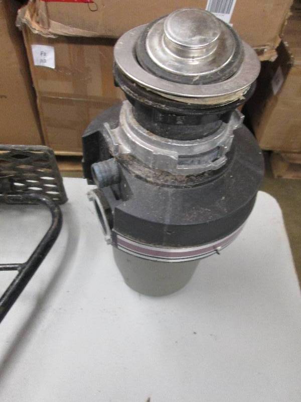 lot 233 image: garbage disposal looks used , stand...