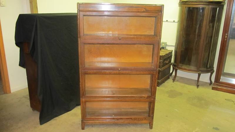 lot 1 image: Antique Gunn Furniture 4 Section Lawyers Bookcase