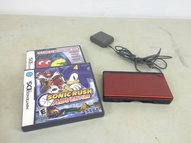 lot 19 image: Nice Clean Working Nintendo DS wGames & Charger