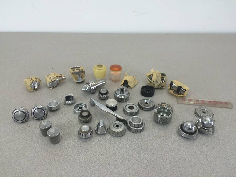 lot 31 image: 1950s-60s Chevy Radio Knobs & Shifter Handles