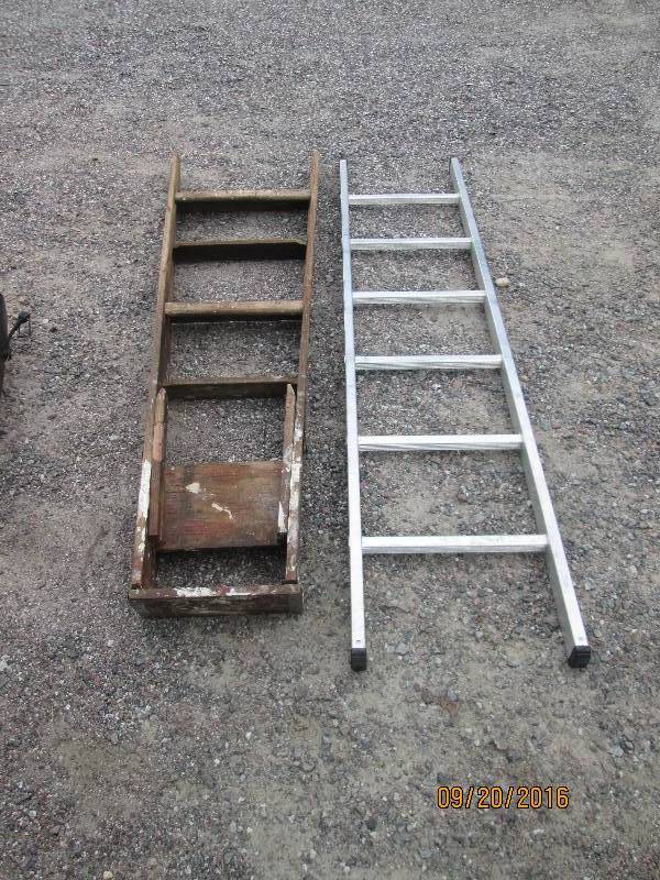 lot 10 image: 1 wood step ladder 68 tall and a m...