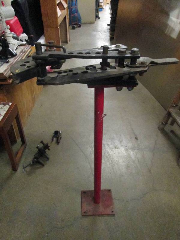 lot 14 image: pipe bender 43 tall with parts loo...