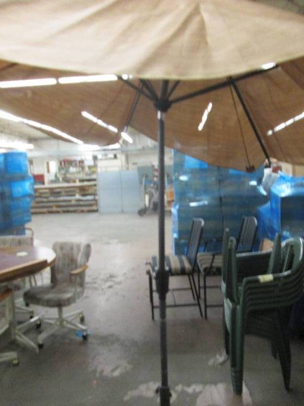 lot 20 image: brown umbrella with base works as i...