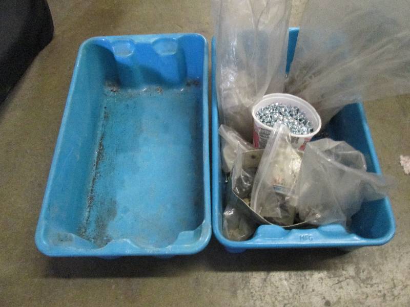 lot 56 image: 2 blue trays 1 full of nuts, washer...