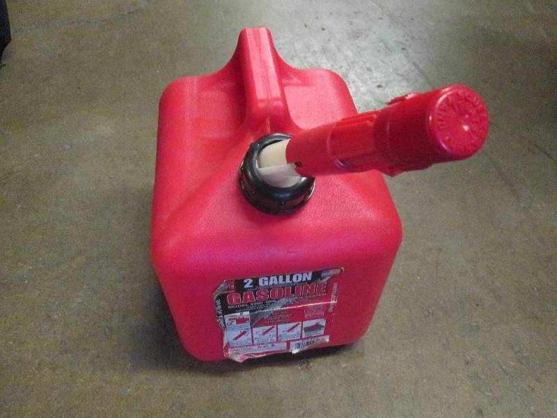 lot 77 image: 2 gallon spill proof gas can used...