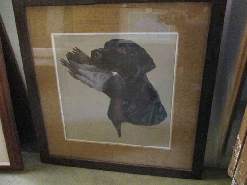 lot 100 image: picture of a dog with a duck in its...