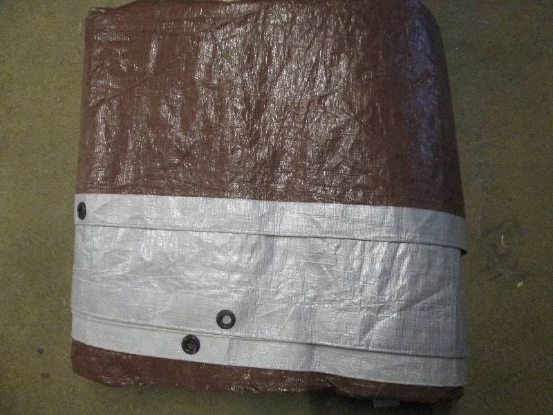 lot 122 image: 9 foot long brown and grey tarp ...