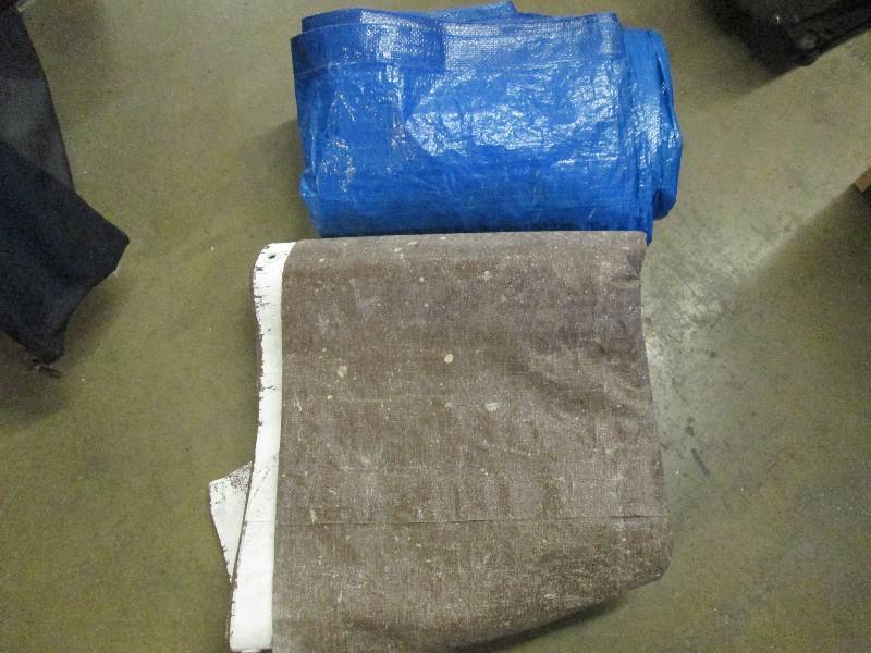 lot 123 image: 1 blue and 1 brown tarp...