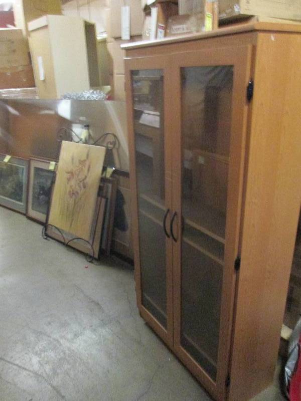 lot 128 image: wood self unit with doors with glas...