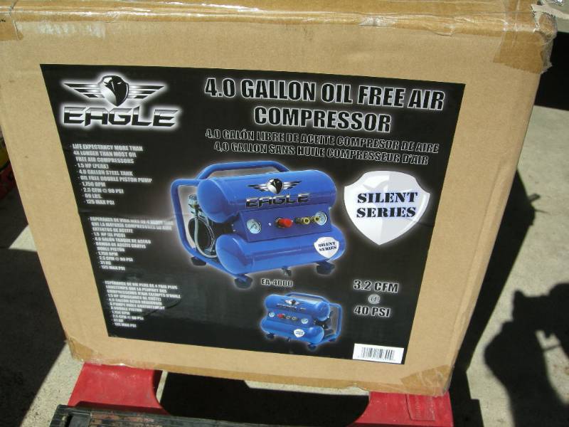 lot 5 image: Eagle Silent Series 4 Gallon Air Compressor
