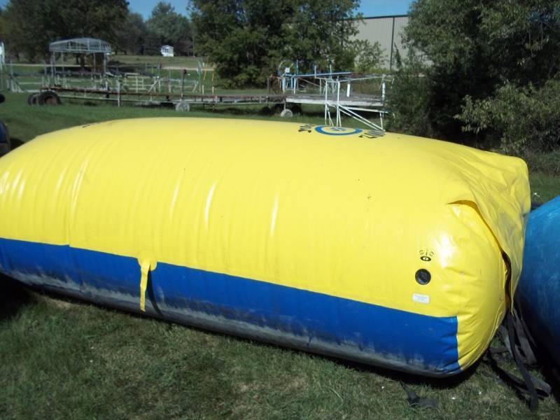 lot 1 image: Aviva Trampoline with Launch pad and EZ Up