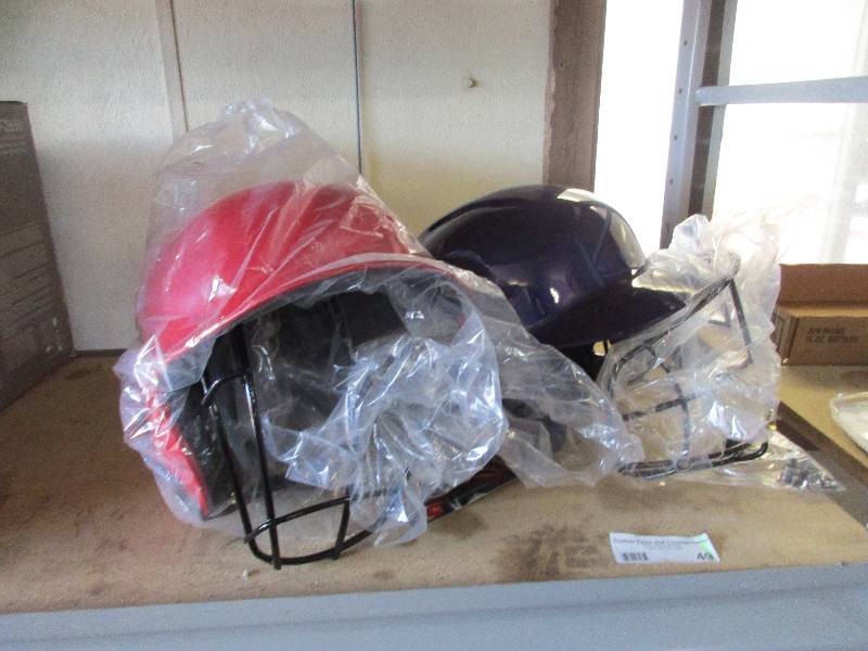 2 Baseball helmets