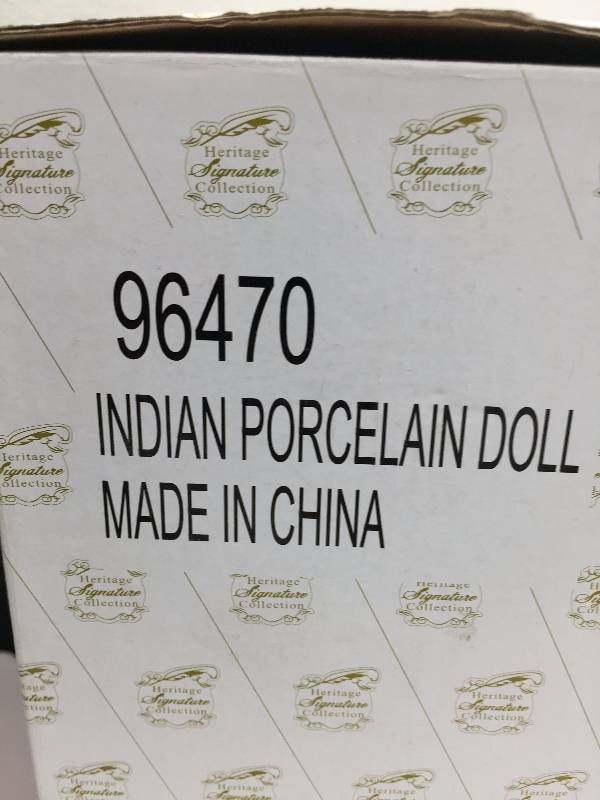 HERITAGE SIGNATURE COLLECTION PORCELAIN DOLL - INDIAN PORCELAIN DOLL & PINAFORE PATTY