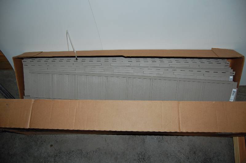 lot 105 image: Cedar Shake Style Plastic Siding