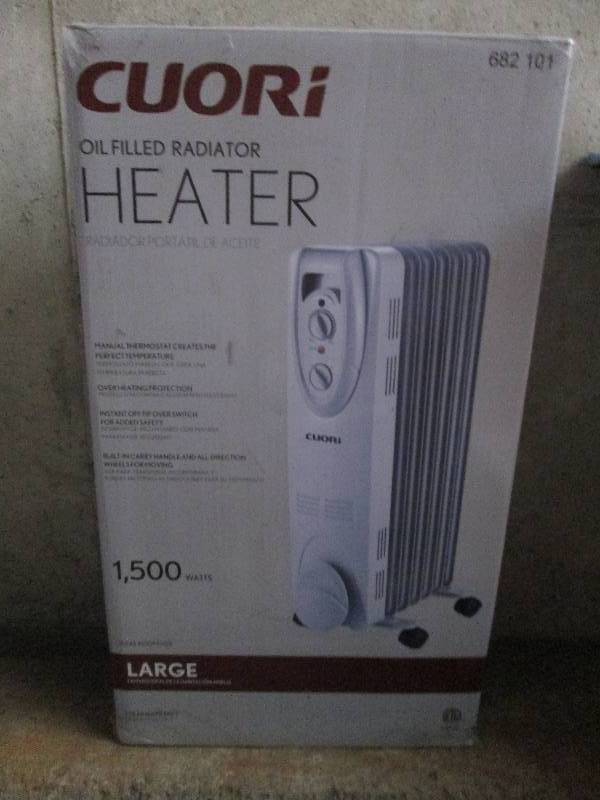 lot 402 image: Cuori oil filled heater 1500 watts ...