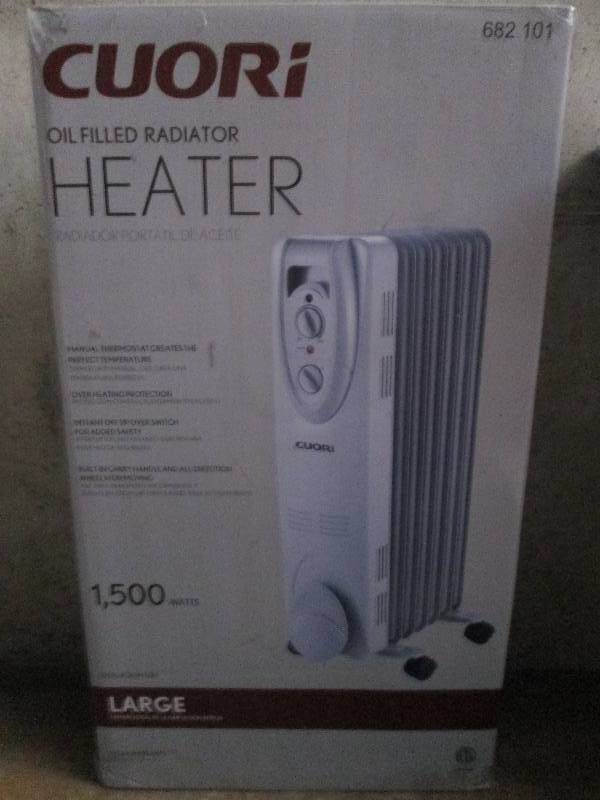 lot 404 image: Cuori oil filled heater 1500 watts ...
