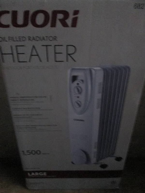 lot 405 image: Cuori oil filled heater 1500 watts ...