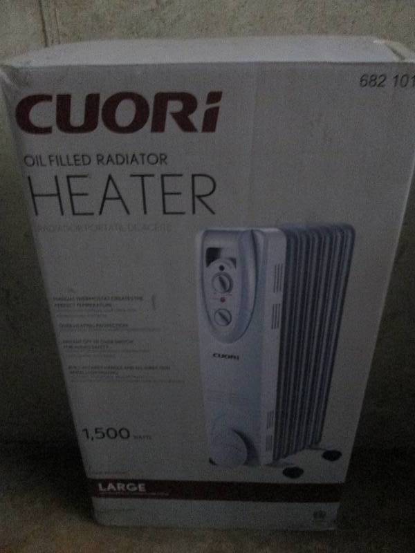 lot 406 image: Cuori oil filled heater 1500 watts ...