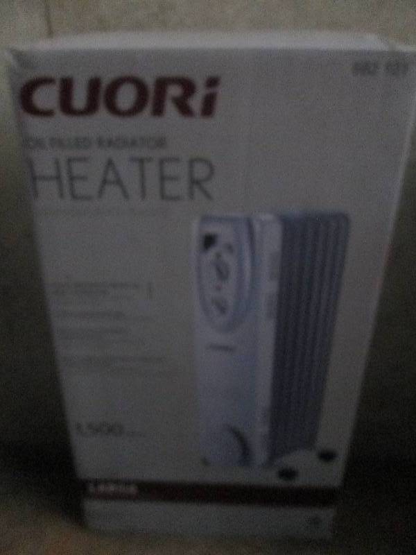 lot 407 image: Cuori oil filled heater 1500 watts ...