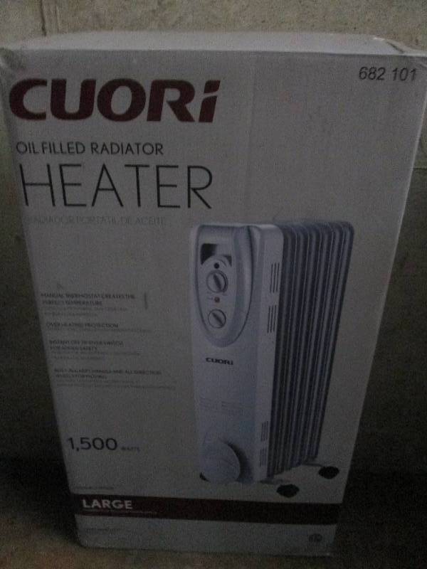 lot 408 image: Cuori oil filled heater 1500 watts ...