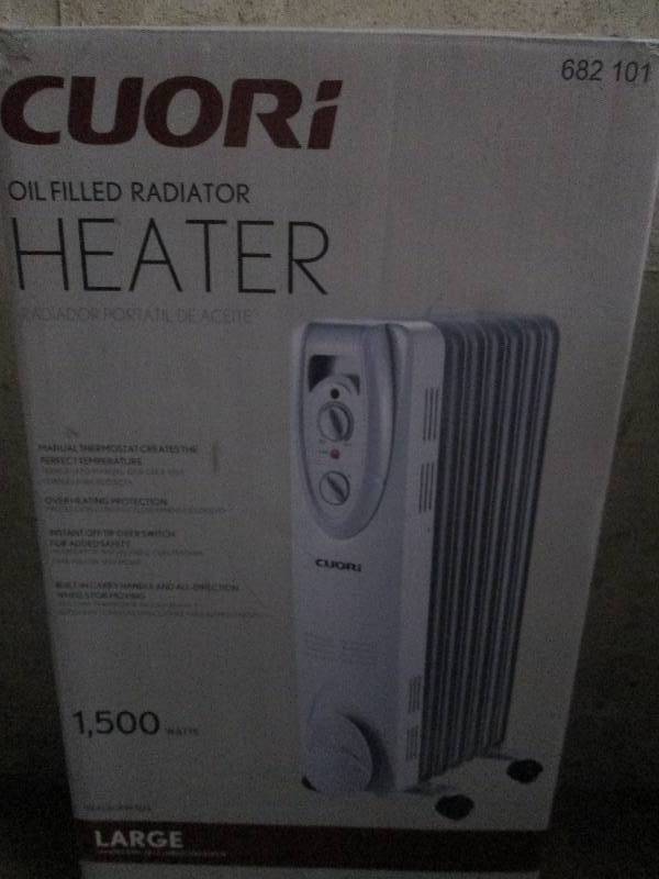 lot 409 image: Cuori oil filled heater 1500 watts ...