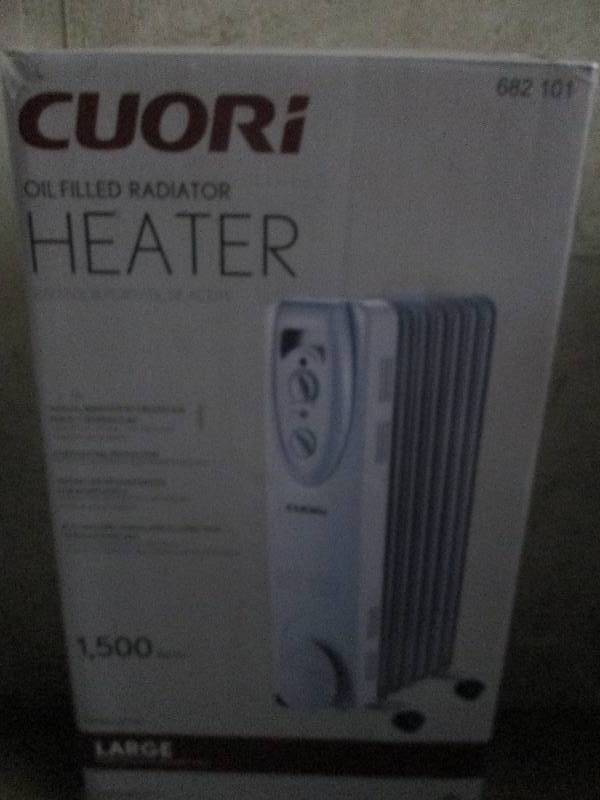 lot 410 image: Cuori oil filled heater 1500 watts ...