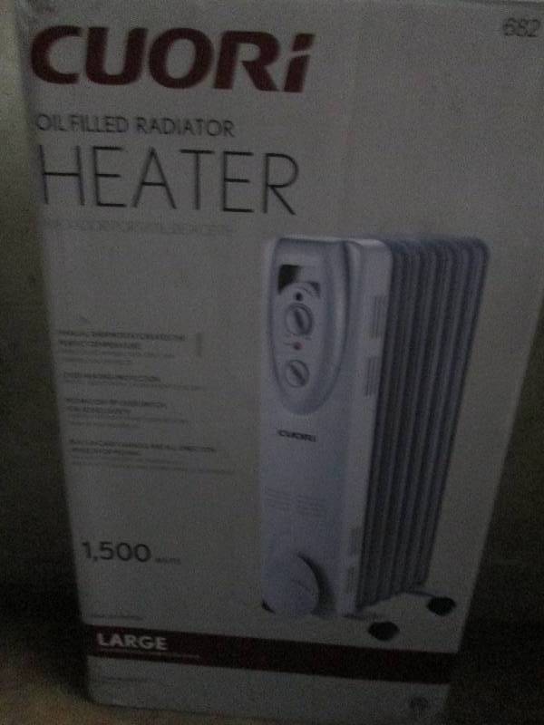 lot 411 image: Cuori oil filled heater 1500 watts ...