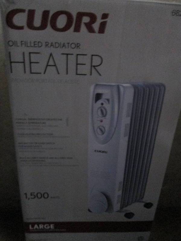 lot 413 image: Cuori oil filled heater 1500 watts ...