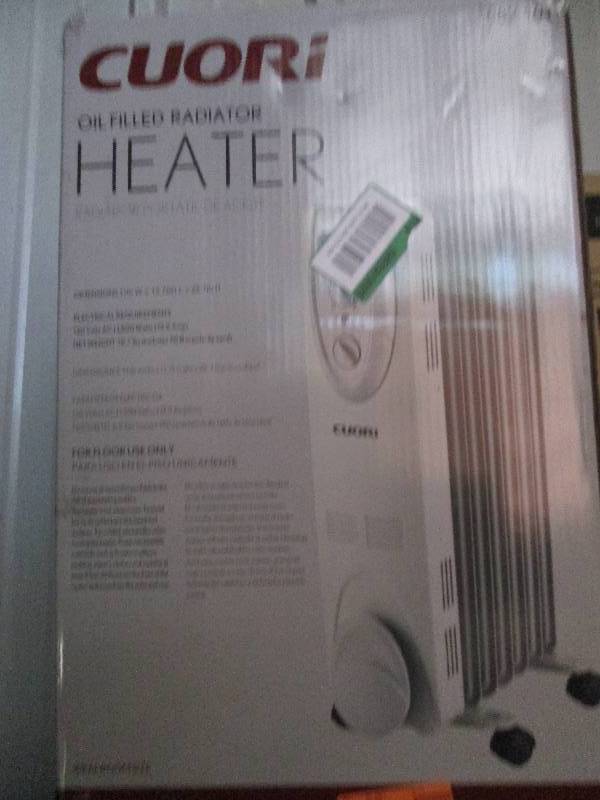 lot 414 image: Cuori oil filled heater 1500 watts ...