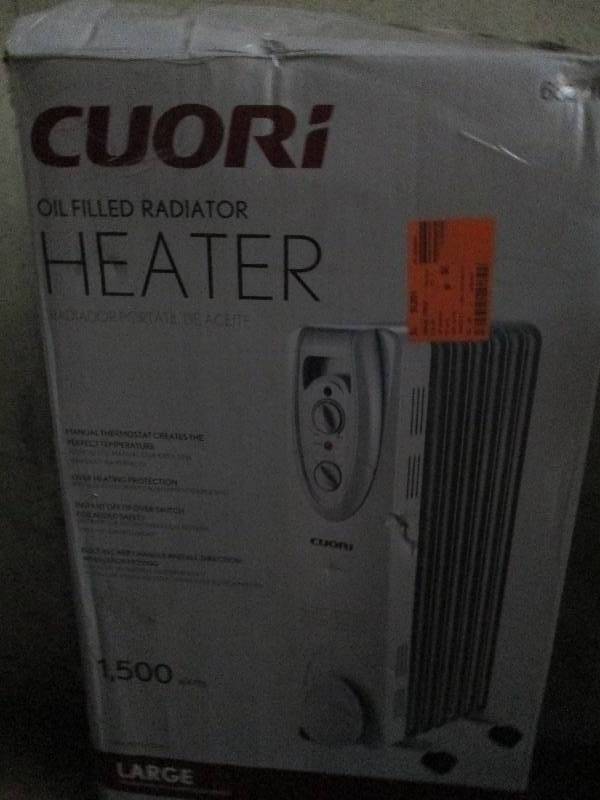 lot 419 image: Cuori oil filled heater 1500 watts ...