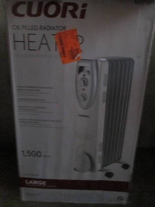 lot 420 image: Cuori oil filled heater 1500 watts ...
