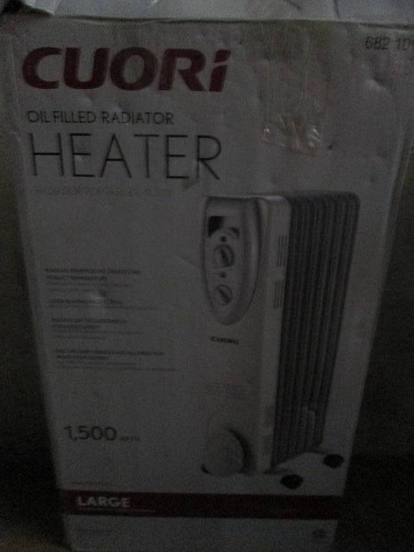 lot 422 image: Cuori oil filled heater 1500 watts ...