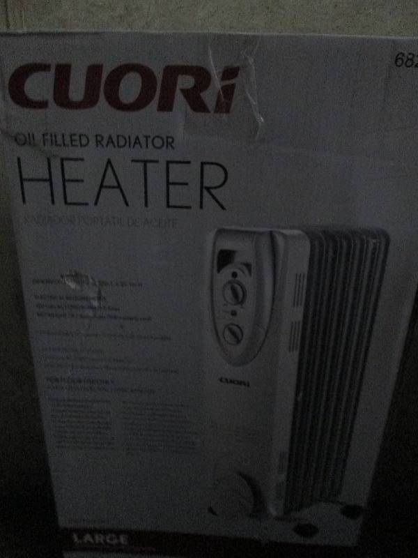 lot 423 image: Cuori oil filled heater 1500 watts ...