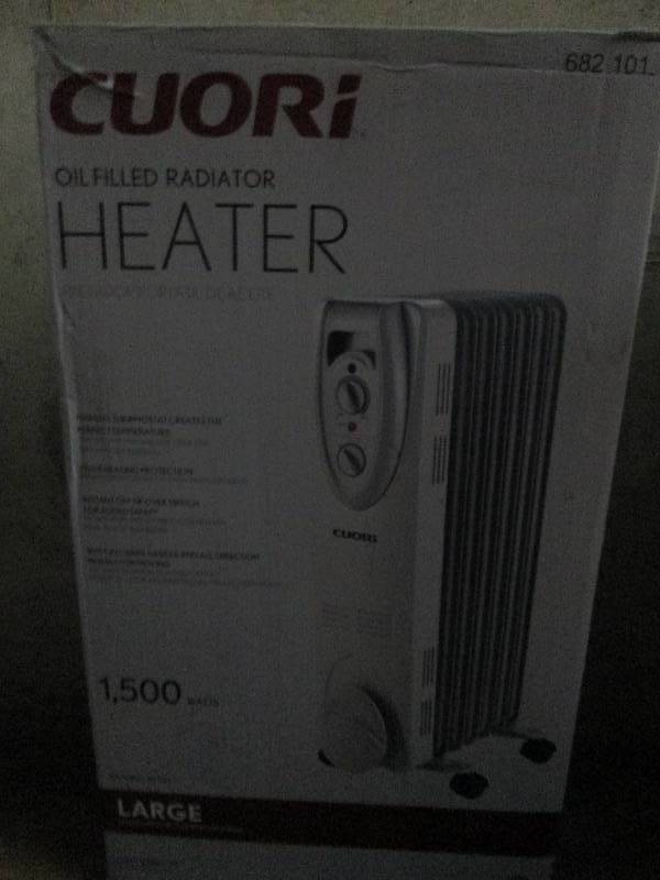 lot 424 image: Cuori oil filled heater 1500 watts ...