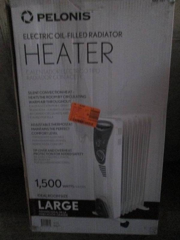 lot 425 image: Pelonis oil filled radiator silent ...