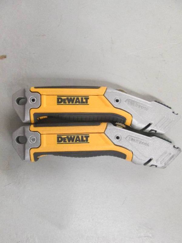 lot 31 image: 2 dewalt retractable knifes open bo...