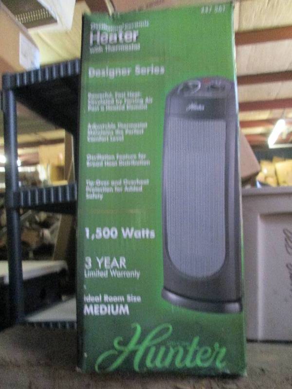 lot 471 image: oscillating ceramic heater designer...
