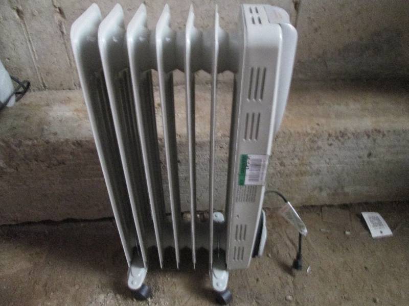 lot 473 image: oil filled radiant heater used unte...