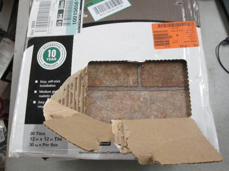 lot 80 image: 3 boxes of 12x12 self stick vinyl...