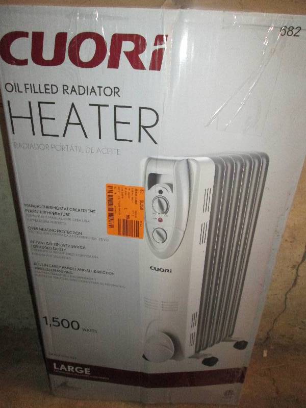 lot 500 image: Cuori oil filled heater 1500 watts ...