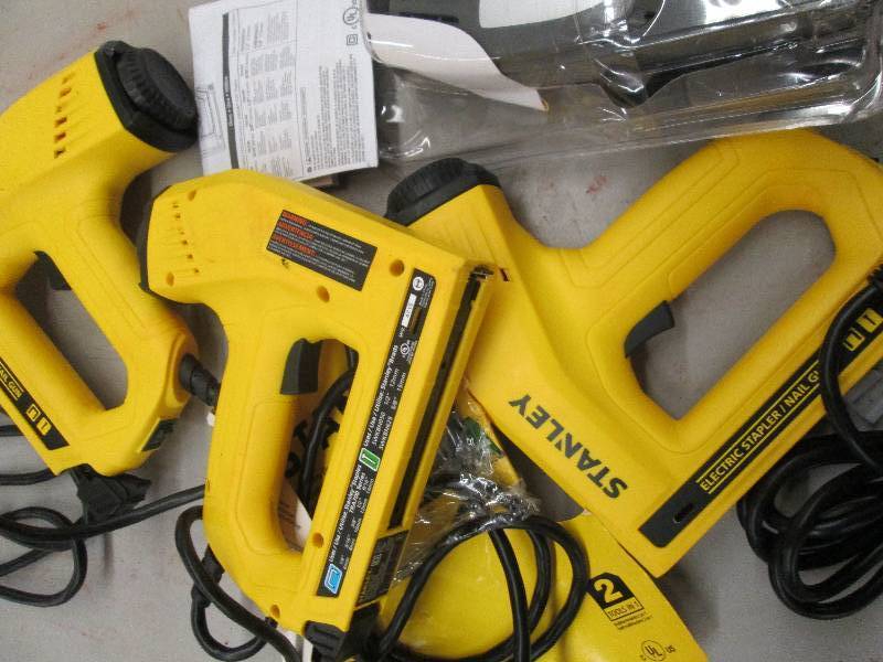 lot 235 image: 4 stanley electric staplers and nai...
