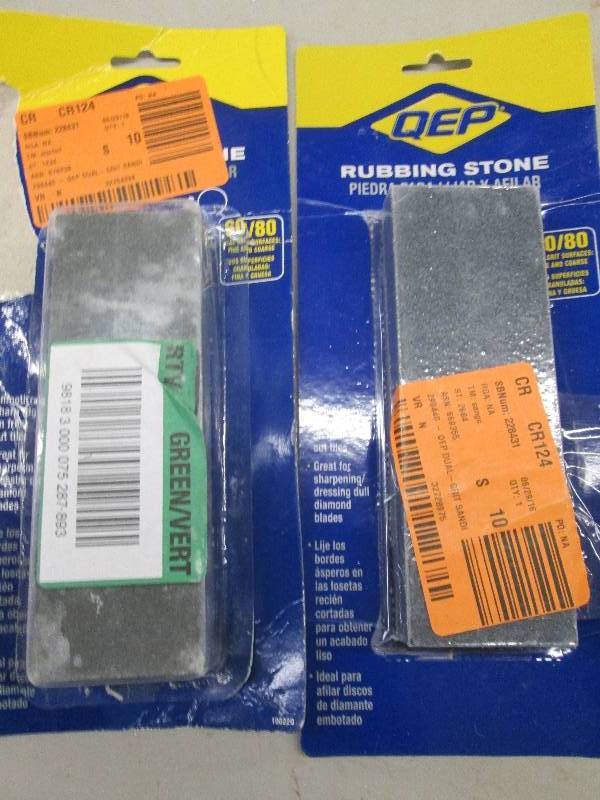lot 312 image: 2 rubbing stones and misc brass fit...
