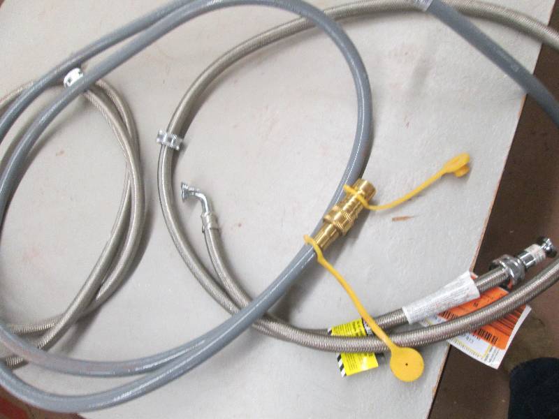lot 313 image: 2 metal washing machine lines and 1...