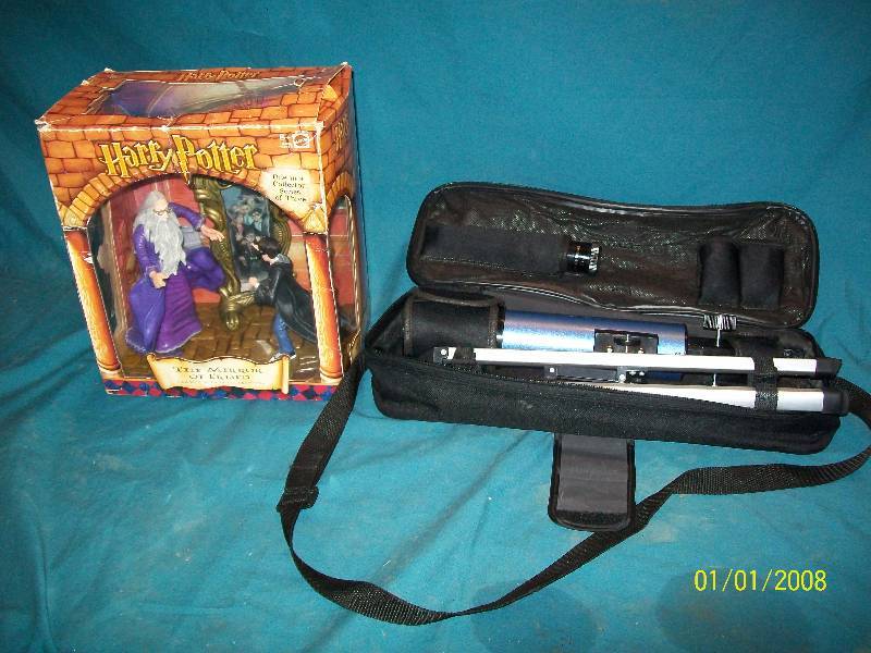 lot 13 image: Harry Potter the Mirror of Erised by Mattel In Box & Carson Travel Telescope Model 36050.