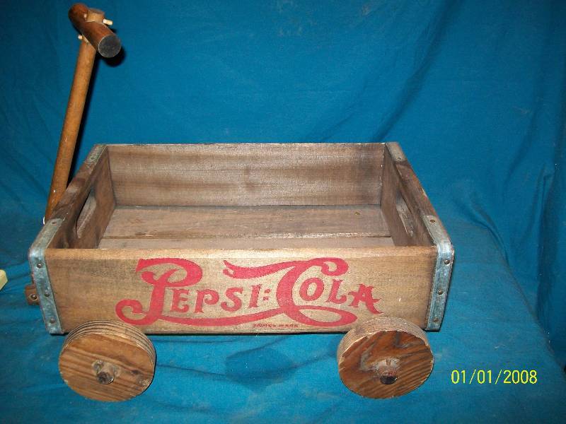 lot 37 image: Vintage Pepsi-Cola Wooden Crate Wagon with Wooden Wheels.