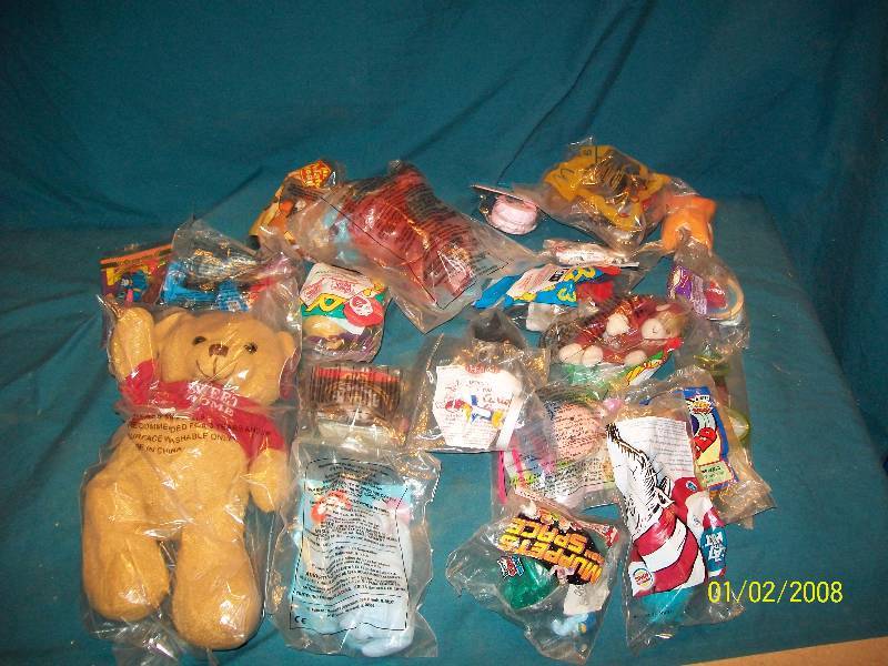 lot 50 image: More than 20 Still in Package Fast Food Toys. Including Home Sweet Home Habitat for Humanity Bear