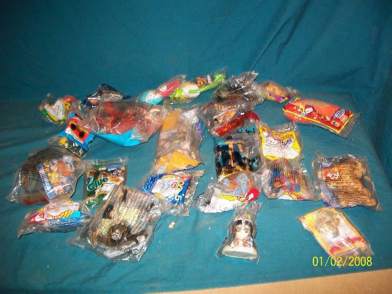 lot 53 image: More than 20 Still in Package Fast Food Toys.