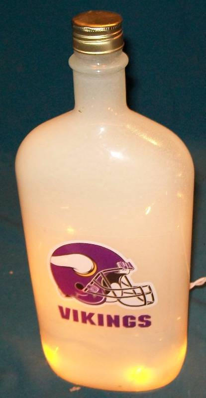 lot 59 image: Minnesota Viking Bottle that Lights Up when plugged In. Approximately 12 x 4